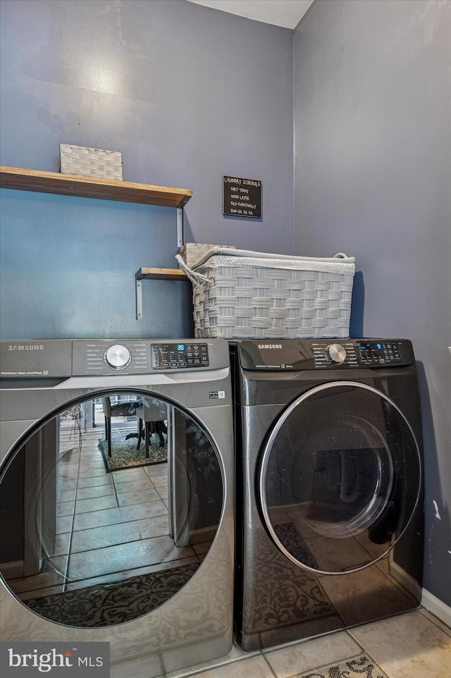 100 Fernwood Dr, Avondale, PA 19311 - clothes washing area featuring separate washer and dryer, tile patterned flooring, and laundry area