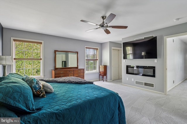 100 Fernwood Dr, Avondale, PA 19311 - carpeted bedroom with baseboards, ceiling fan, and visible vents