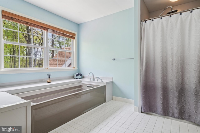 100 Fernwood Dr, Avondale, PA 19311 - bathroom featuring baseboards, tile patterned floors, a shower with shower curtain, and a bath