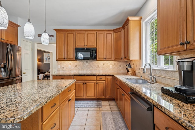 100 Fernwood Dr, Avondale, PA 19311 - kitchen with a sink, backsplash, black appliances, and brown cabinetry