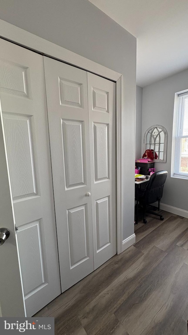 6707 Ditman St, Philadelphia, PA 19135 - detailed view of wood finished floors, a desk, and baseboards