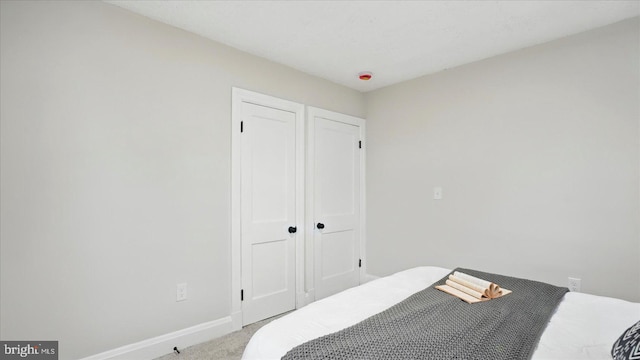2910 Salisbury Ave, Baltimore, MD 21219 - bedroom featuring baseboards and carpet