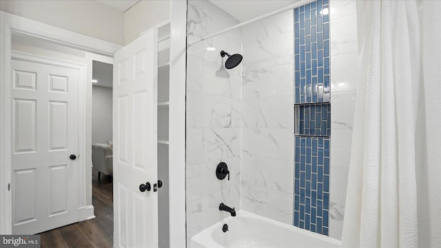 2910 Salisbury Ave, Baltimore, MD 21219 - bathroom featuring shower / bathtub combination with curtain and wood finished floors
