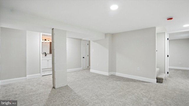 2910 Salisbury Ave, Baltimore, MD 21219 - finished below grade area featuring a sink, baseboards, carpet, and recessed lighting