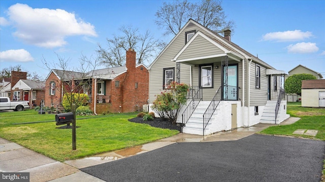 2910 Salisbury Ave, Baltimore, MD 21219 - view of front of house featuring a front yard and a residential view