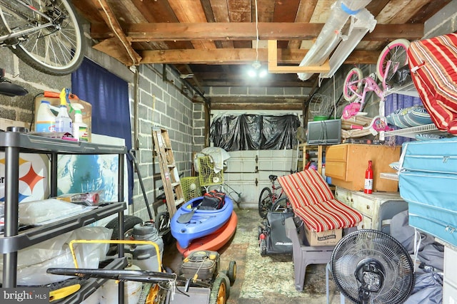 interior space featuring concrete block wall