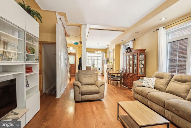 225 Buckingham Pl, Philadelphia, PA 19104 - living room featuring a notable chandelier and light wood-style flooring