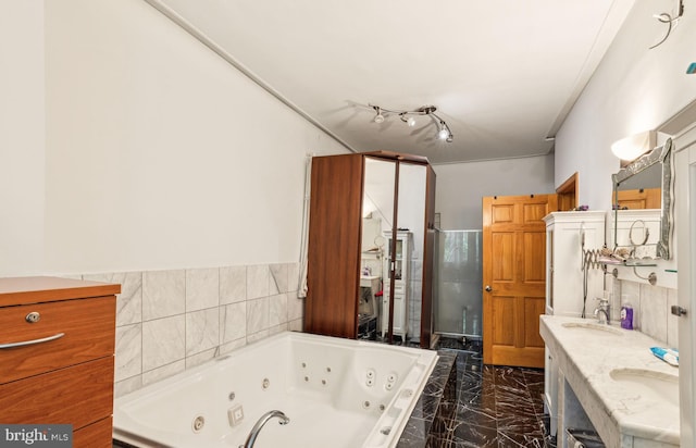 225 Buckingham Pl, Philadelphia, PA 19104 - full bathroom with double vanity, a stall shower, a tub with jets, a sink, and marble finish floor