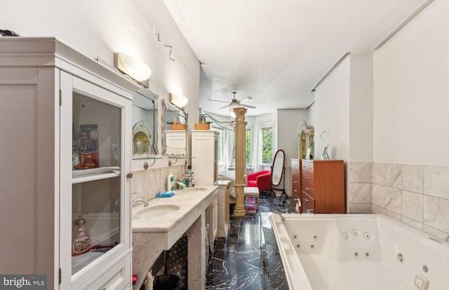225 Buckingham Pl, Philadelphia, PA 19104 - full bath with double vanity, marble finish floor, a jetted tub, ceiling fan, and a sink