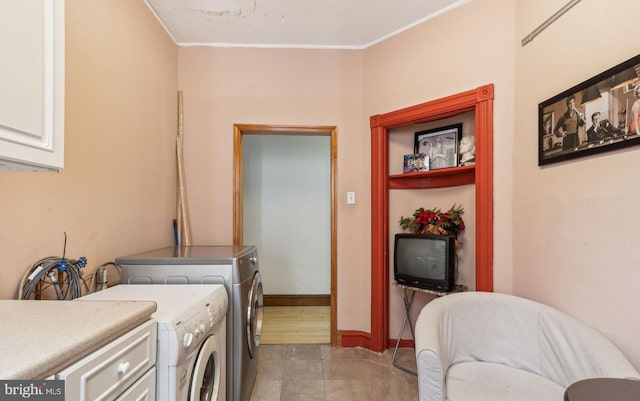 225 Buckingham Pl, Philadelphia, PA 19104 - laundry room featuring cabinet space, crown molding, and washer and dryer
