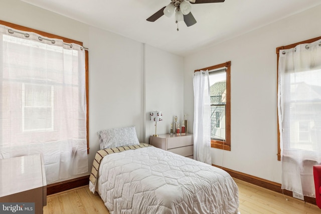 225 Buckingham Pl, Philadelphia, PA 19104 - bedroom with baseboards, ceiling fan, and light wood-type flooring