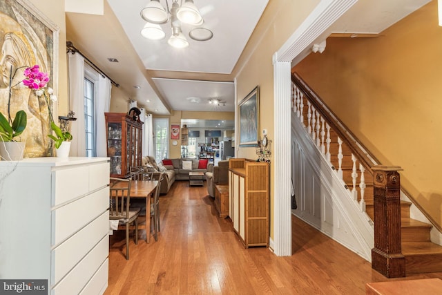 225 Buckingham Pl, Philadelphia, PA 19104 - entrance foyer featuring light wood-type flooring, stairs, and an inviting chandelier