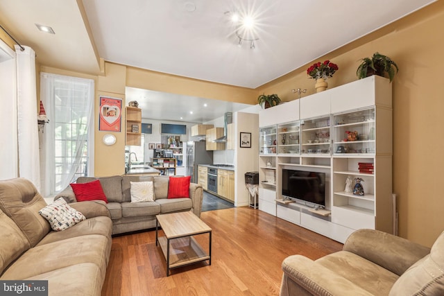 225 Buckingham Pl, Philadelphia, PA 19104 - living area featuring light wood-style flooring