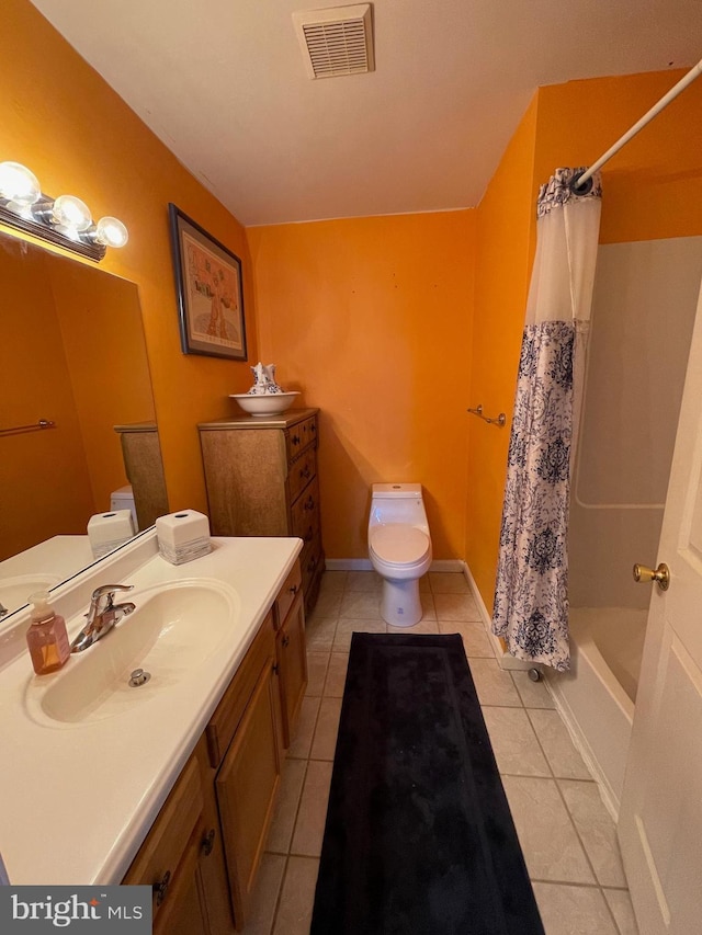 full bathroom featuring visible vents, tile patterned flooring, shower / bath combo, vanity, and toilet