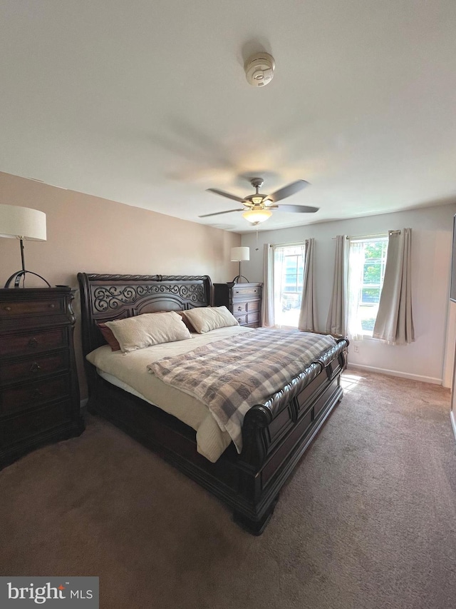 bedroom with carpet floors and a ceiling fan