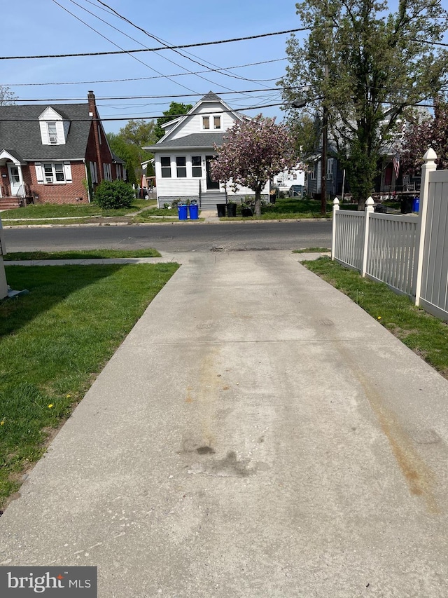 view of street featuring driveway
