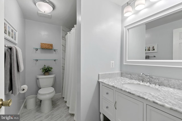 10945 Harpers Square Ct, Reston, VA 20191 - full bath featuring toilet, vanity, marble finish flooring, baseboards, and a shower with curtain