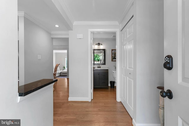 10945 Harpers Square Ct, Reston, VA 20191 - corridor with light wood-type flooring, baseboards, ornamental molding, and recessed lighting