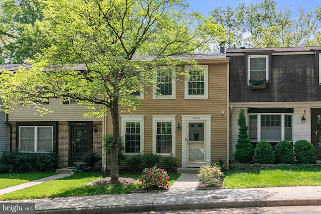 10945 Harpers Square Ct, Reston, VA 20191 - view of property featuring a front lawn