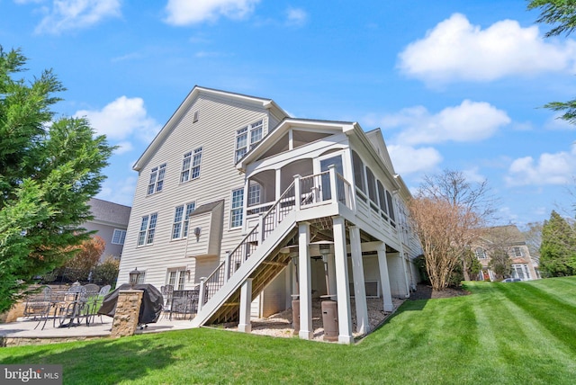 43005 Running Ridge Way, Leesburg, VA 20176 - back of property featuring a patio, stairs, a sunroom, and a yard