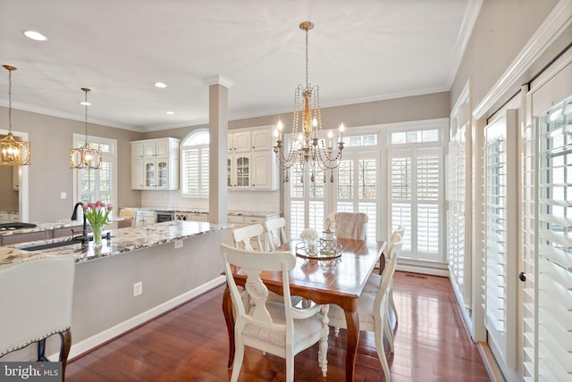 43005 Running Ridge Way, Leesburg, VA 20176 - dining area featuring a chandelier, wood finished floors, recessed lighting, and crown molding