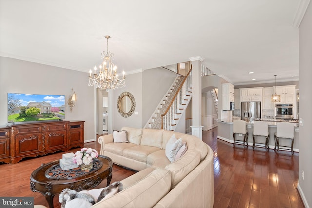 43005 Running Ridge Way, Leesburg, VA 20176 - living room with stairway, dark wood-style floors, ornamental molding, a chandelier, and baseboards