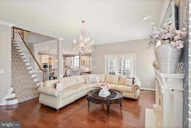 43005 Running Ridge Way, Leesburg, VA 20176 - living area with a chandelier, stairs, wood finished floors, crown molding, and baseboards