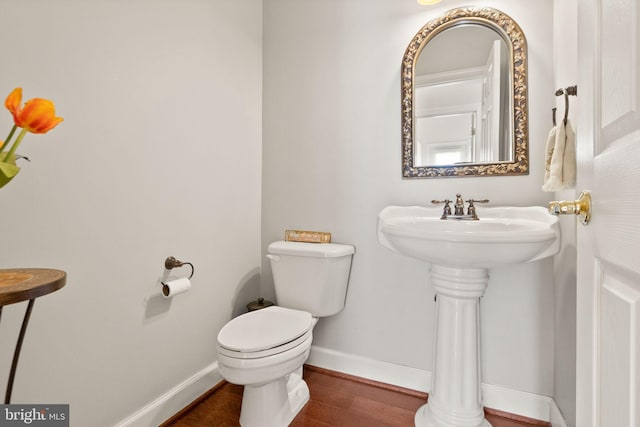 43005 Running Ridge Way, Leesburg, VA 20176 - half bathroom featuring toilet, wood finished floors, and baseboards