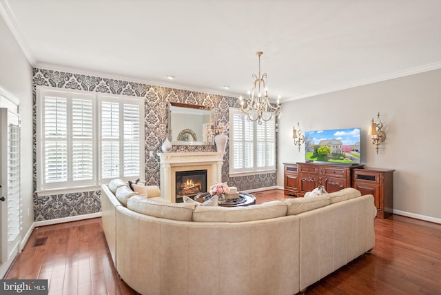 43005 Running Ridge Way, Leesburg, VA 20176 - living area featuring baseboards, hardwood / wood-style flooring, healthy amount of natural light, a chandelier, and ornamental molding