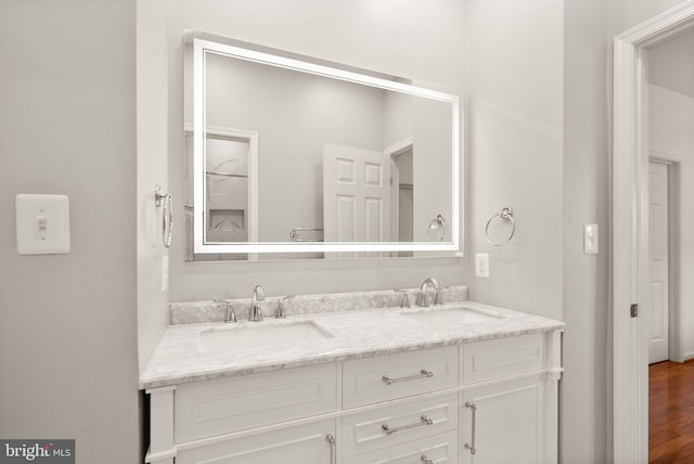 43005 Running Ridge Way, Leesburg, VA 20176 - bathroom with double vanity and wood finished floors