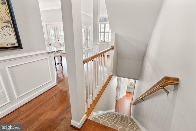43005 Running Ridge Way, Leesburg, VA 20176 - staircase featuring wood finished floors, plenty of natural light, and crown molding