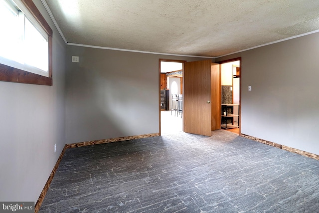 2447 General Potter Hwy, Centre Hall, PA 16828 - unfurnished room with crown molding, baseboards, and a textured ceiling