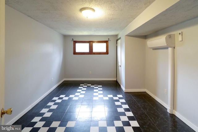 2447 General Potter Hwy, Centre Hall, PA 16828 - spare room with baseboards, a textured ceiling, a wall unit AC, and dark floors