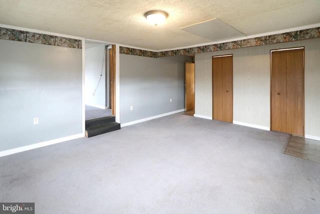 2447 General Potter Hwy, Centre Hall, PA 16828 - unfurnished bedroom with baseboards, a textured ceiling, and carpet