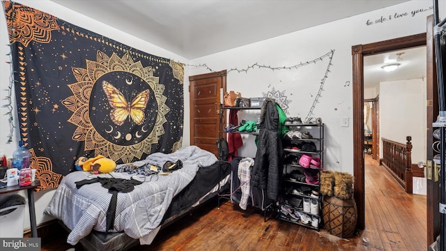 bedroom featuring hardwood / wood-style floors