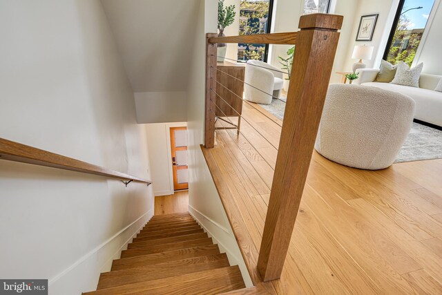 1023 Irving St NW Unit 2, Washington, DC 20010 - stairway featuring plenty of natural light and wood finished floors