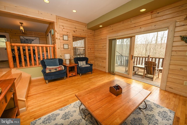 1419 Sandy Shores Rd, Mc Henry, MD 21541 - living room featuring recessed lighting, wooden walls, and hardwood / wood-style flooring
