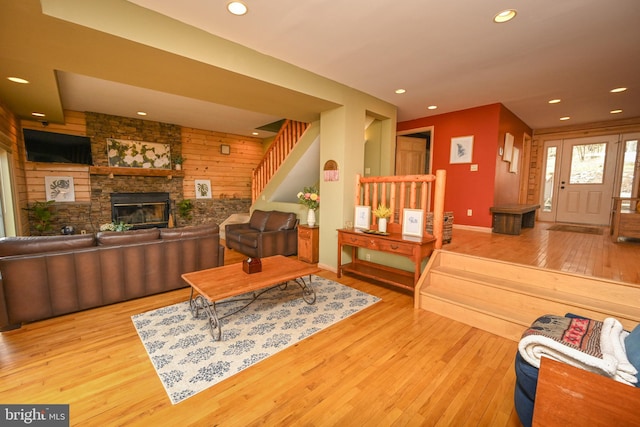 1419 Sandy Shores Rd, Mc Henry, MD 21541 - living room featuring stairs, a fireplace, recessed lighting, and wood-type flooring