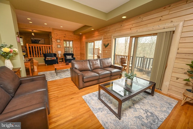 1419 Sandy Shores Rd, Mc Henry, MD 21541 - living room featuring recessed lighting, wooden walls, a wood stove, and wood finished floors