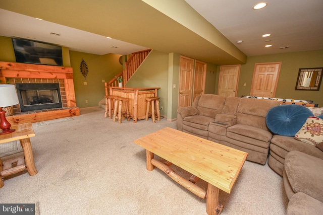 1419 Sandy Shores Rd, Mc Henry, MD 21541 - carpeted living room with a tiled fireplace, a dry bar, baseboards, and recessed lighting