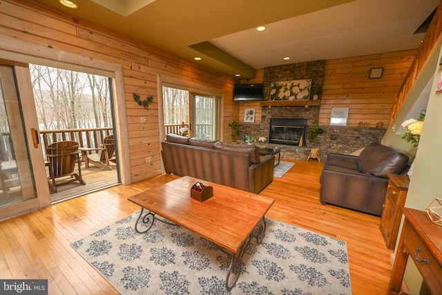 1419 Sandy Shores Rd, Mc Henry, MD 21541 - living room featuring hardwood / wood-style floors, a fireplace, recessed lighting, and wooden walls