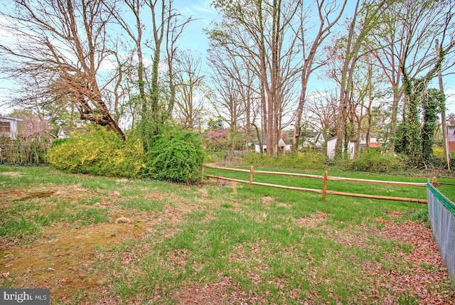 view of yard with fence