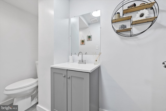 1629 Malvern St, Baltimore, MD 21224 - half bathroom with baseboards, toilet, and vanity