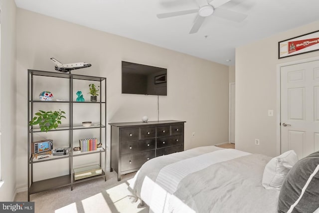 bedroom with carpet flooring and a ceiling fan