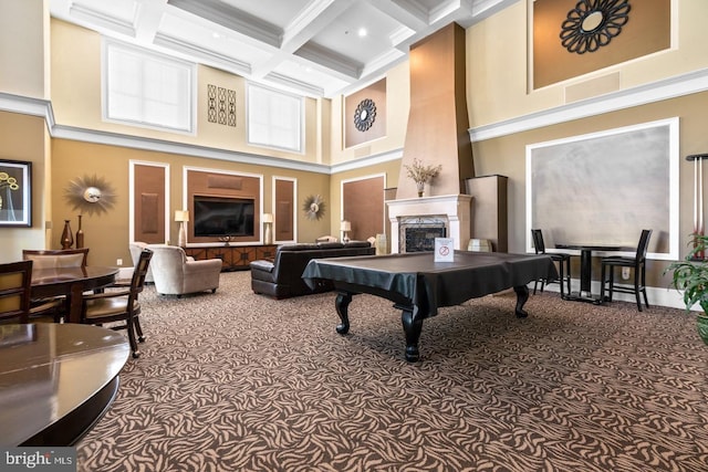game room with a high ceiling, carpet, coffered ceiling, beam ceiling, and a premium fireplace