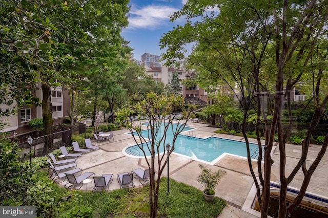 1524 Lincoln Way Unit 409, Mclean, VA 22102 - community pool featuring fence and a patio