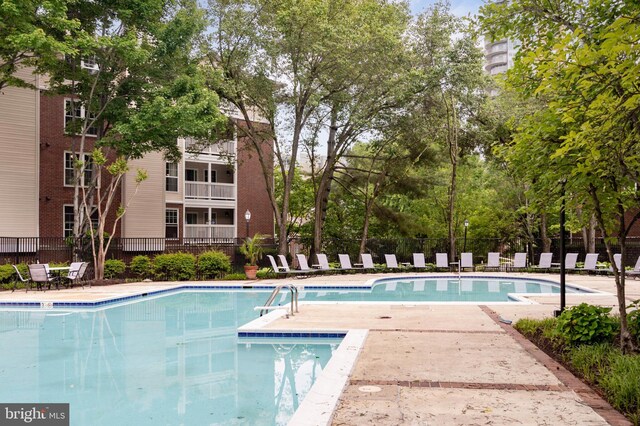 1524 Lincoln Way Unit 409, Mclean, VA 22102 - community pool with fence and a patio area