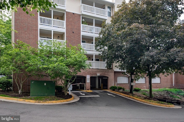 1524 Lincoln Way Unit 409, Mclean, VA 22102 - view of property with uncovered parking