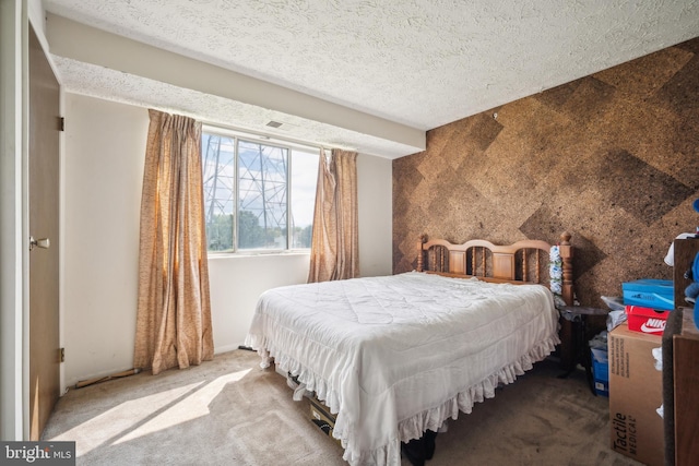 997 Heather Ridge Dr Unit 3G, Frederick, MD 21702 - carpeted bedroom featuring a textured ceiling