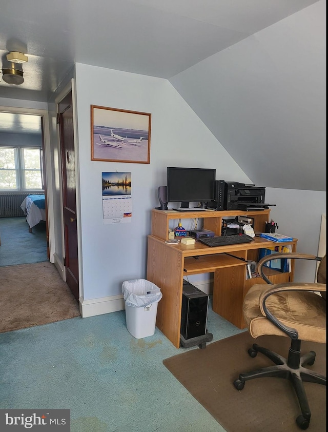 office area featuring carpet flooring and vaulted ceiling